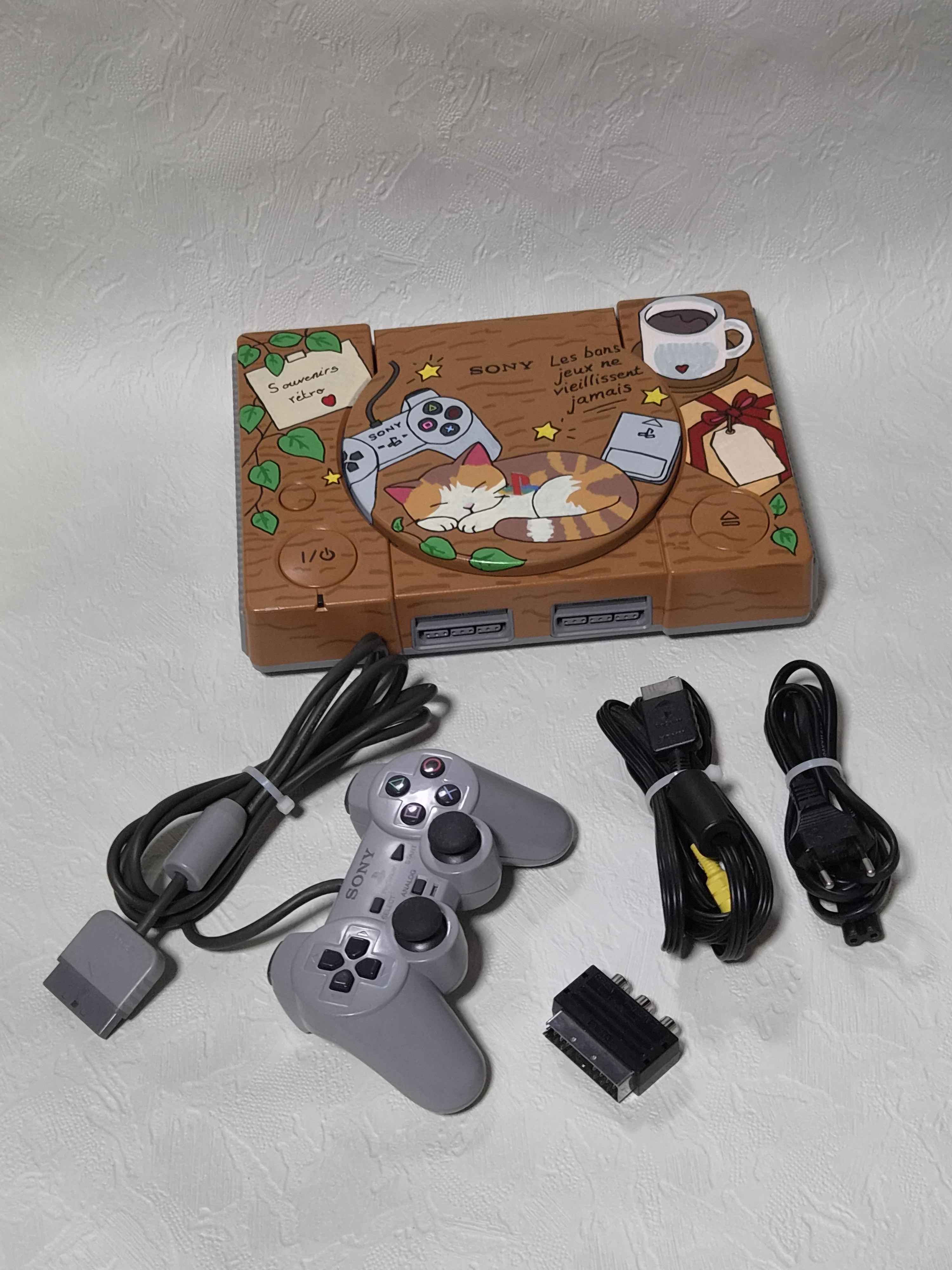 PlayStation personnalisée Layerivo avec sa manette et ses câbles